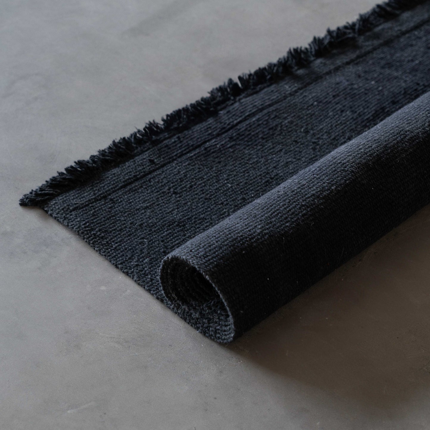 Nawaf Handmade Black Wool Rug